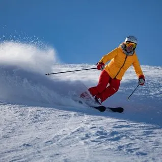Tourist enjoying skiing in Gulmarg Kashmir on snow-covered slopes